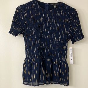Aqua size S blouse, from Bloomingdale’s. Tag still attached